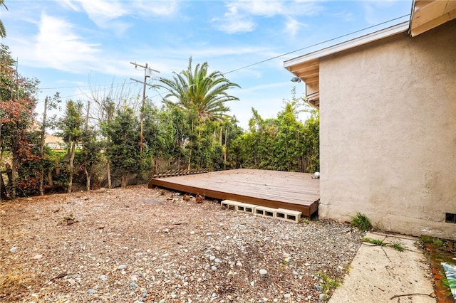 view of yard with a deck