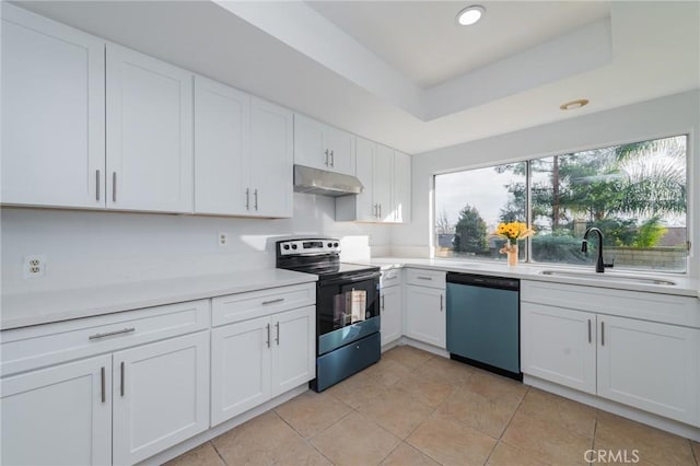 kitchen with sink, range with electric stovetop, a tray ceiling, dishwasher, and white cabinets