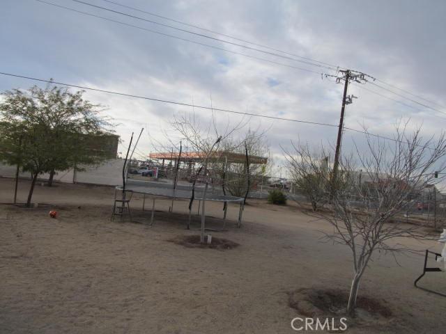 view of yard featuring a trampoline