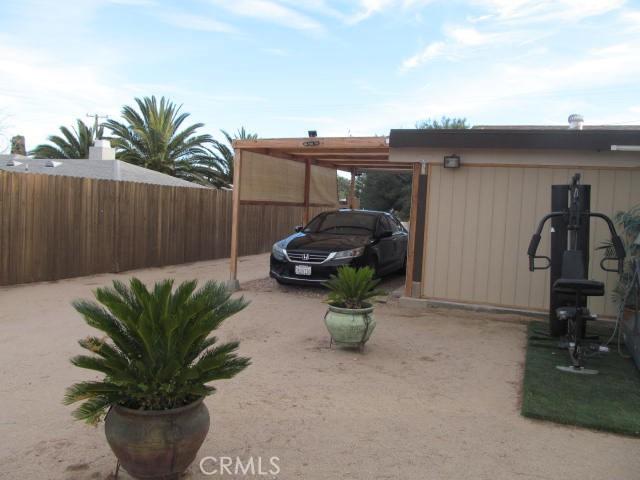 view of car parking featuring a carport