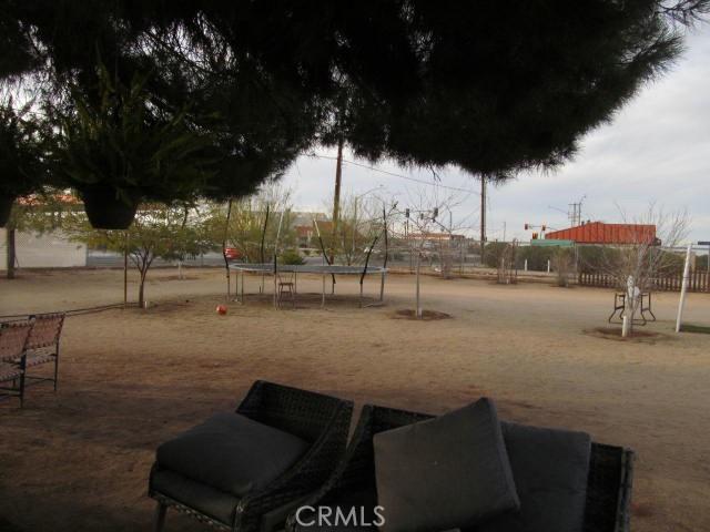 view of home's community with a trampoline