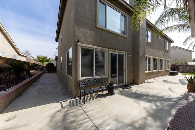 rear view of property featuring a patio