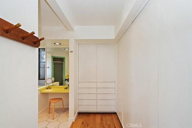 hallway featuring light hardwood / wood-style flooring