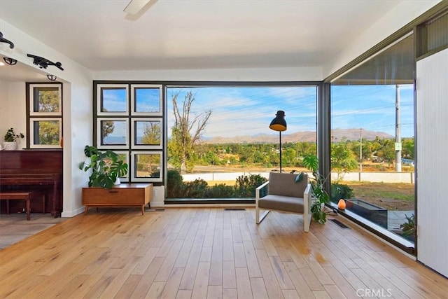 sunroom featuring a healthy amount of sunlight