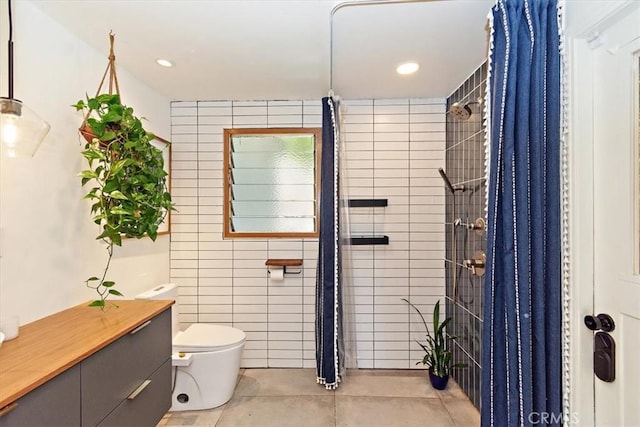 bathroom with tile patterned flooring, tile walls, toilet, and a shower with shower curtain