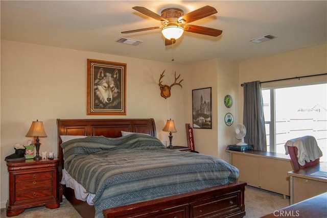 bedroom with light colored carpet and ceiling fan