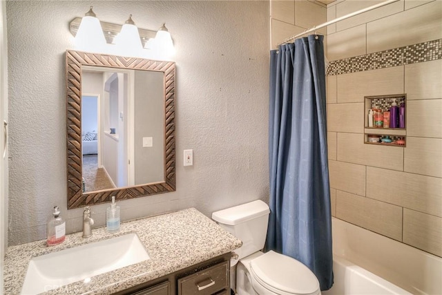 full bathroom featuring vanity, toilet, and shower / tub combo with curtain