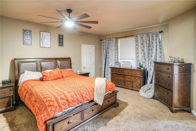 bedroom featuring light colored carpet and ceiling fan