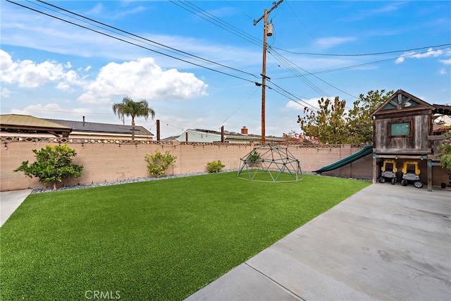 view of yard with a playground