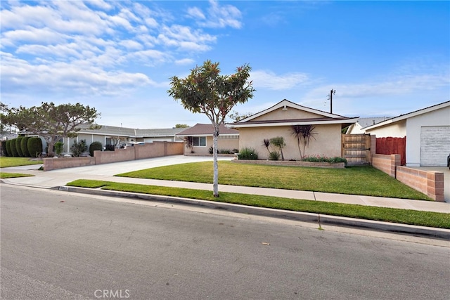 ranch-style house with a front lawn