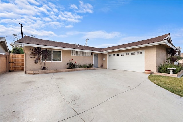 ranch-style home with a garage