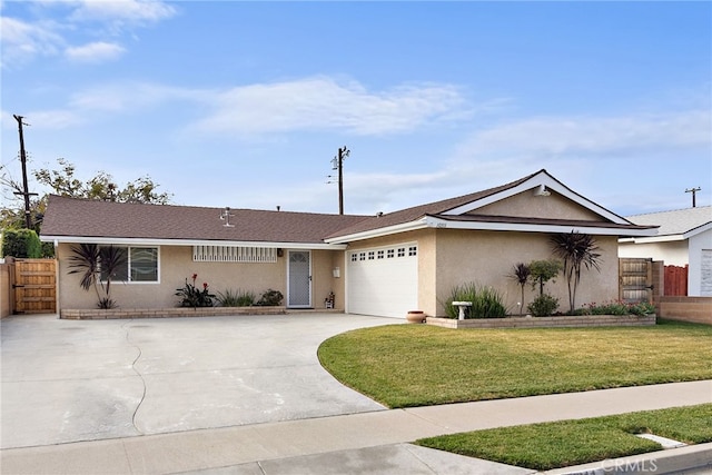 single story home featuring a garage and a front yard