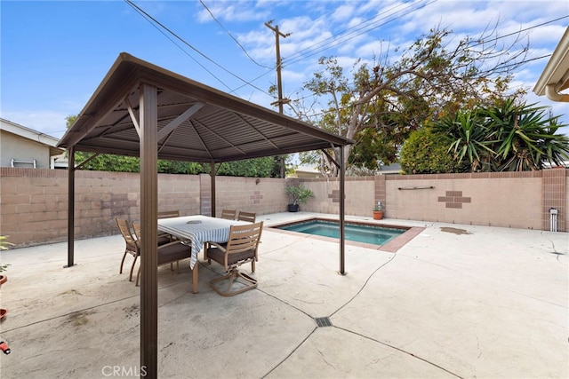 view of pool with a gazebo, a jacuzzi, and a patio area