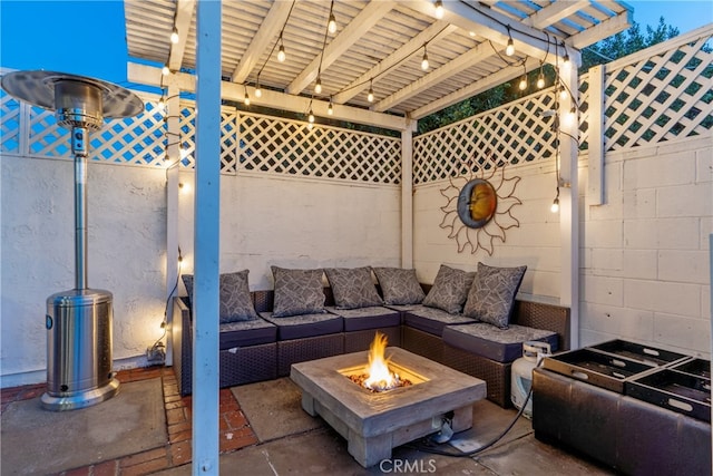 view of patio with an outdoor living space with a fire pit, fence, and a pergola