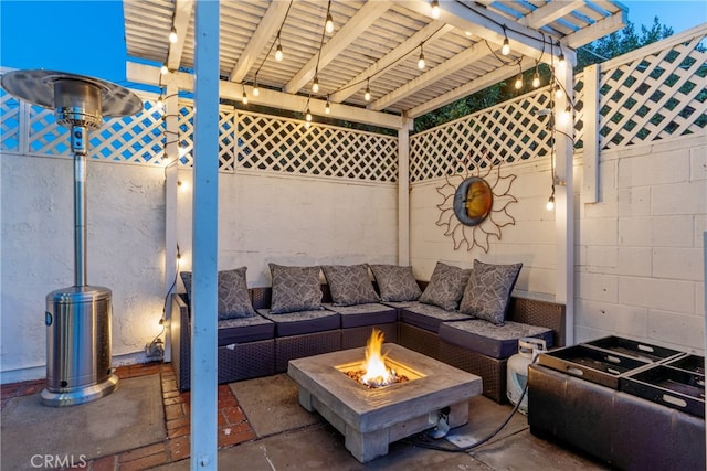 view of patio / terrace with fence, an outdoor living space with a fire pit, and a pergola