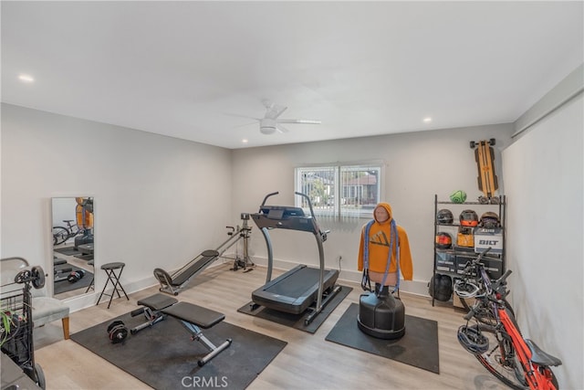 workout area featuring wood finished floors, recessed lighting, and ceiling fan