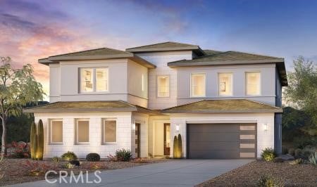 view of front of house with a garage