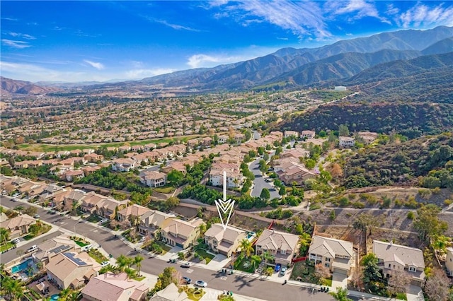 drone / aerial view featuring a mountain view