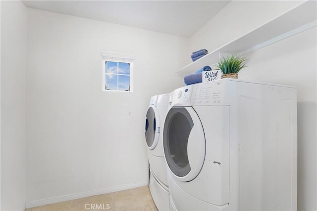 laundry area featuring independent washer and dryer