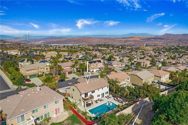 drone / aerial view featuring a mountain view