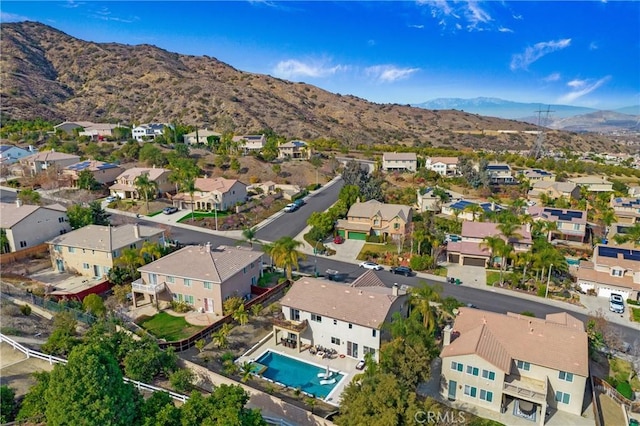 bird's eye view with a mountain view