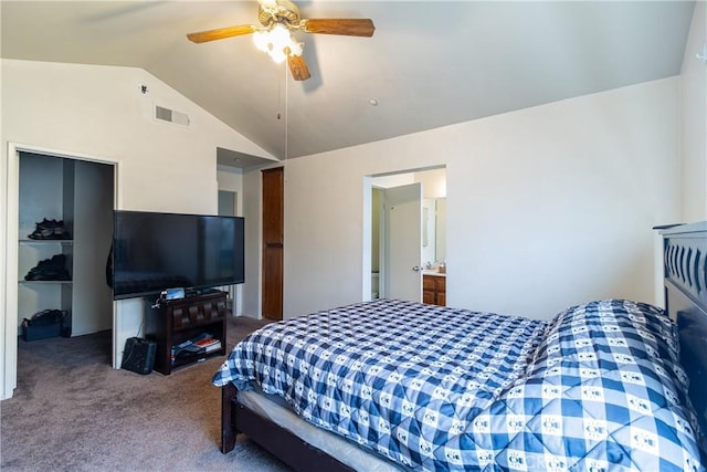 carpeted bedroom with vaulted ceiling and ceiling fan