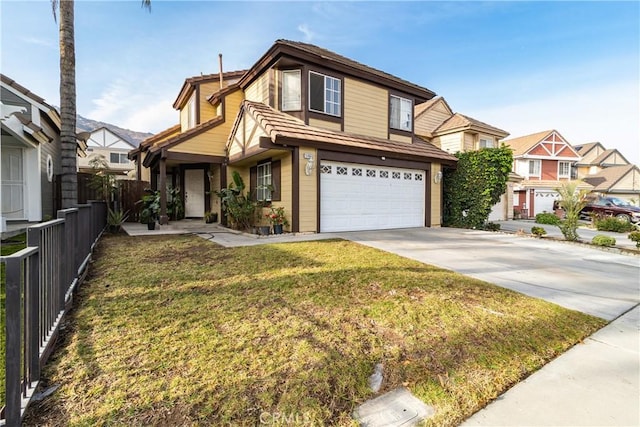 view of front facade featuring a garage and a front yard