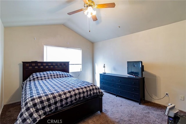 bedroom featuring carpet floors, vaulted ceiling, and ceiling fan