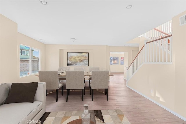 dining room with light hardwood / wood-style flooring