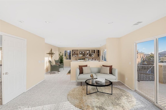 living room featuring light colored carpet