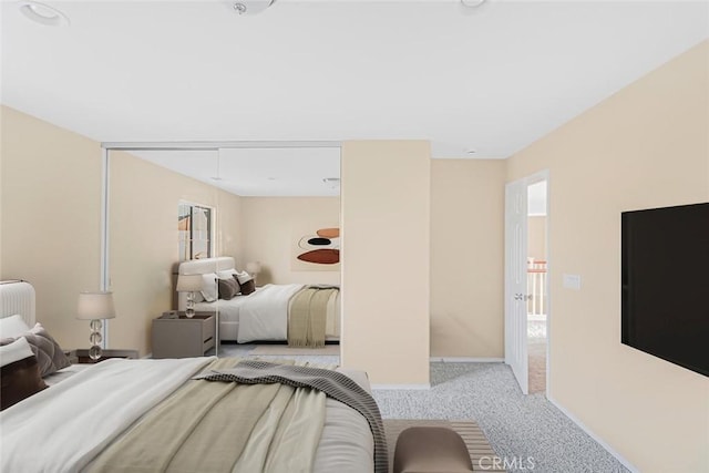 bedroom featuring radiator heating unit and light carpet