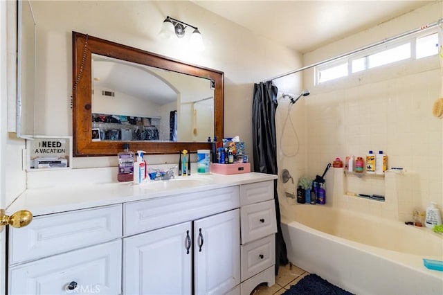 bathroom featuring vanity, tile patterned floors, and shower / bath combination with curtain