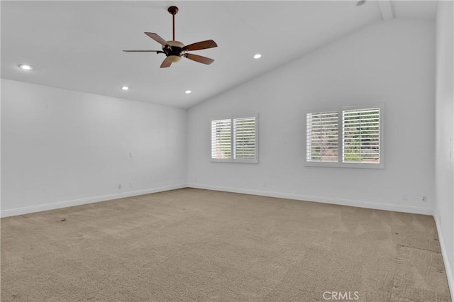 unfurnished room with light carpet, high vaulted ceiling, and ceiling fan