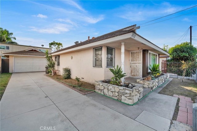 view of front of home with a garage