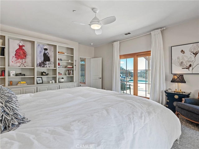 bedroom with access to exterior, ceiling fan, and visible vents