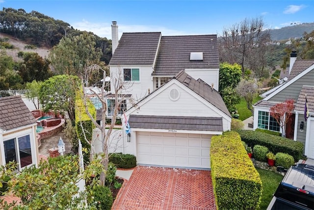 view of front of property with a garage