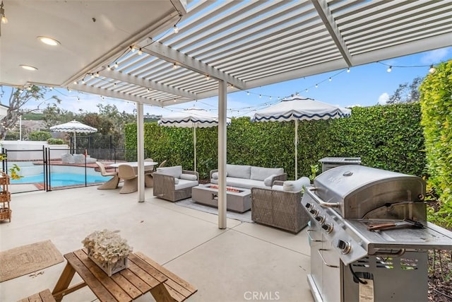 view of patio featuring area for grilling, a fenced in pool, a pergola, and an outdoor hangout area