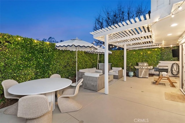 view of patio / terrace featuring a grill, a pergola, and an outdoor living space