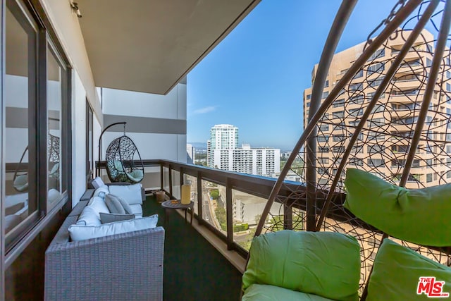 balcony with an outdoor hangout area