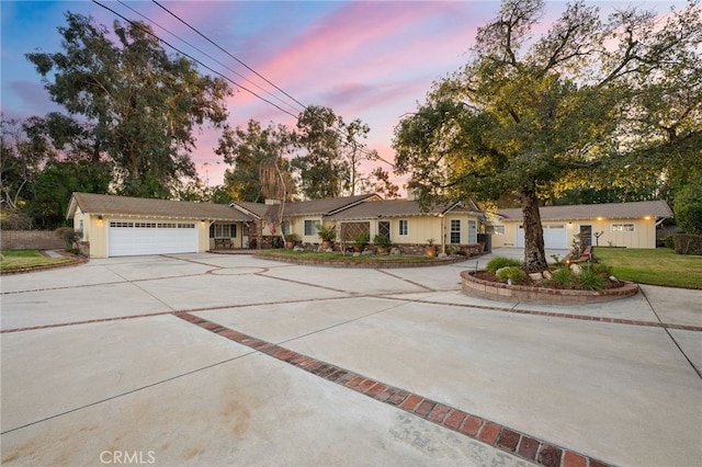 ranch-style home with a garage