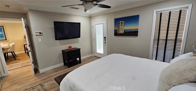 bedroom featuring crown molding, ceiling fan, light hardwood / wood-style floors, and access to outside