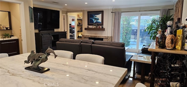 dining area with crown molding