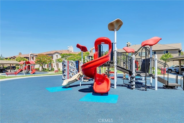 communal playground with a residential view