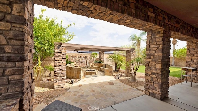 view of patio featuring a pergola