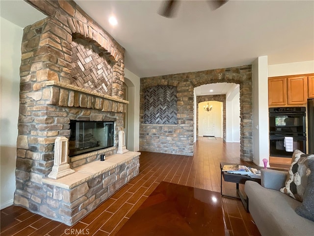 unfurnished living room with a large fireplace