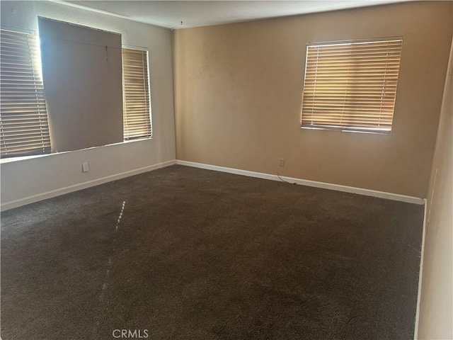 view of carpeted spare room