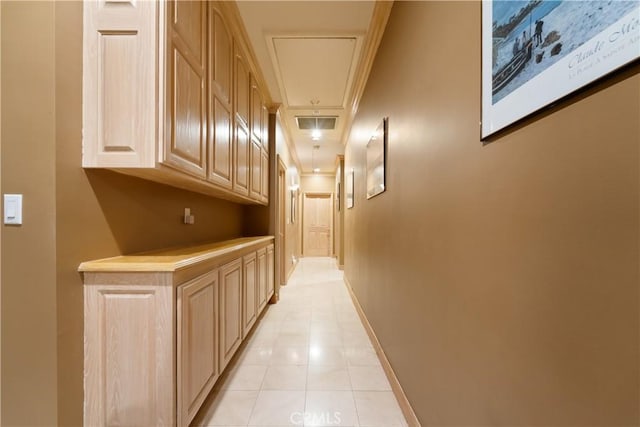 hallway featuring ornamental molding