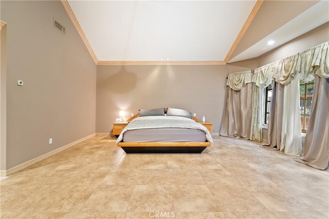 bedroom featuring crown molding and lofted ceiling