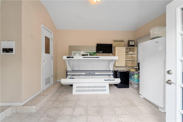 miscellaneous room featuring light tile patterned floors