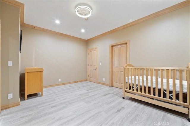 6011 Paseo La Vis, Woodland Hills, CA 91367 - unfurnished bedroom with light wood-style floors, ornamental molding, baseboards, and recessed lighting